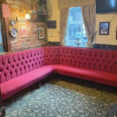 Bespoke Red Bench Seating With Buttoned Back Rests