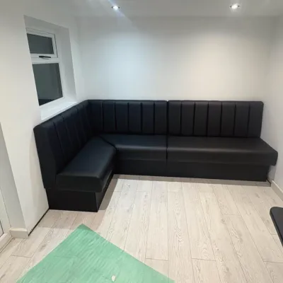 L Shaped Black Fixed Seating