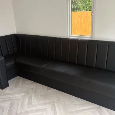 Long L Shaped Fixed Seating With Cupholder Arm